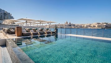Indoor pool, outdoor pool, pool umbrellas, sun loungers