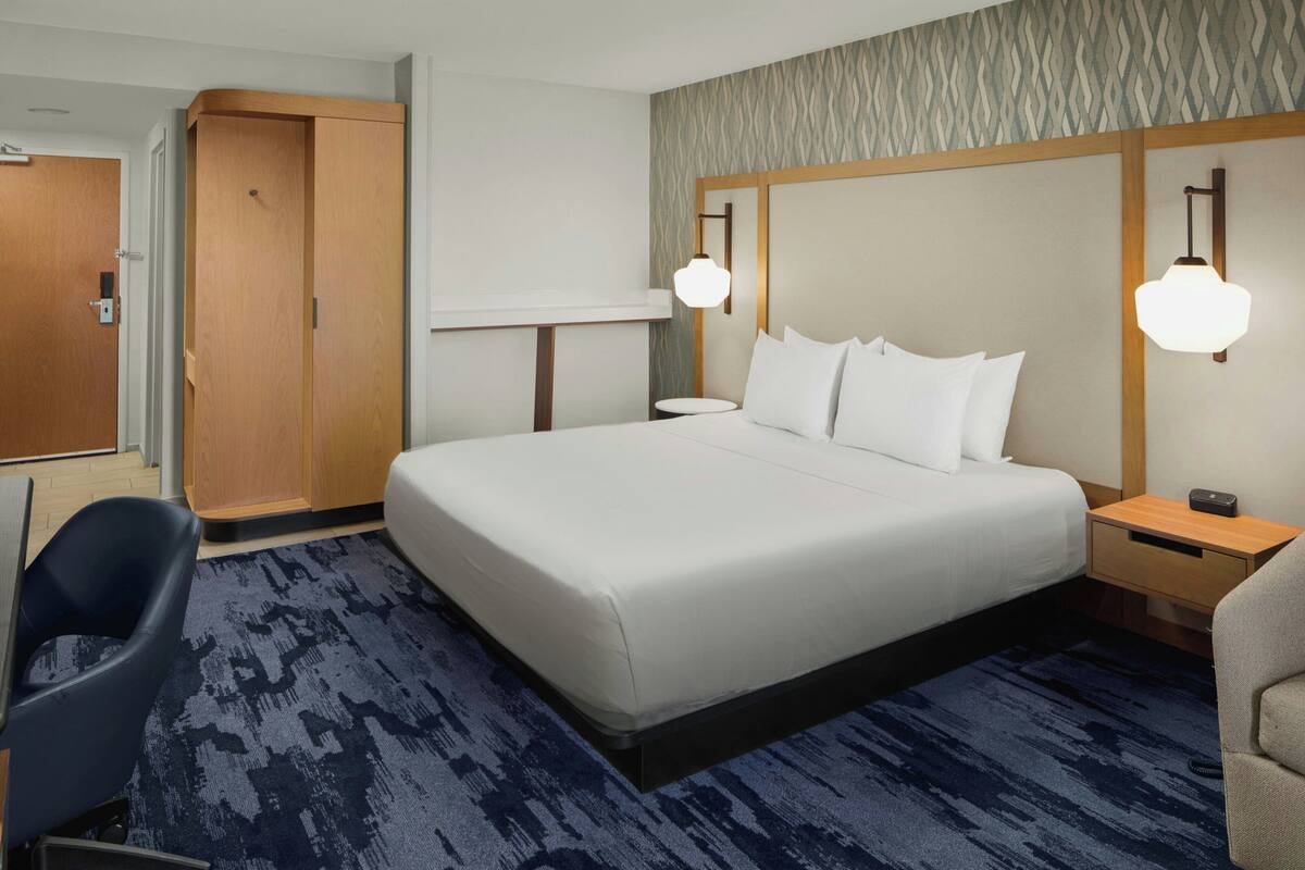 Premium bedding, down comforters, desk, laptop workspace