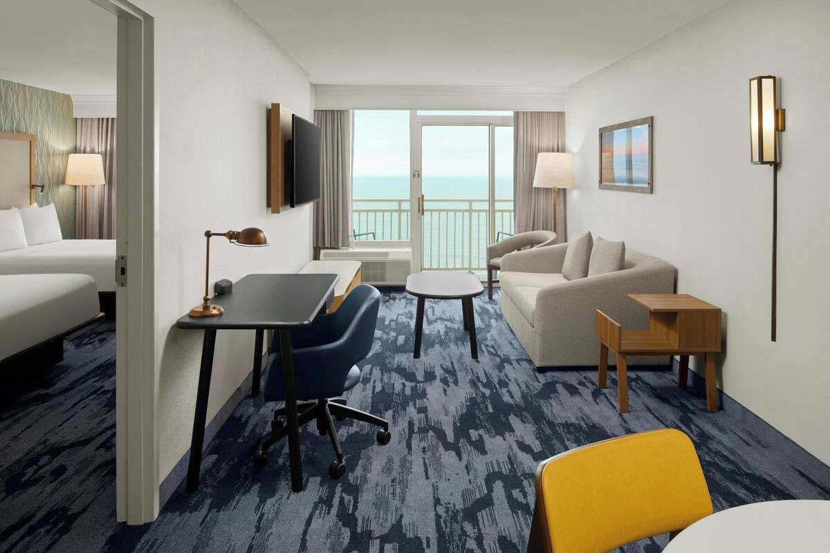 Premium bedding, down comforters, desk, laptop workspace
