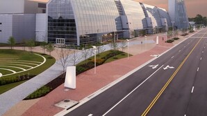 A modern building with a glass facade and a unique angular design. - Fairfield Inn & Suites by Marriott Virginia Beach Oceanfront (Virginia Beach)