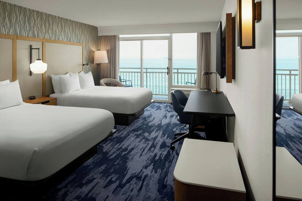 Premium bedding, down comforters, desk, laptop workspace