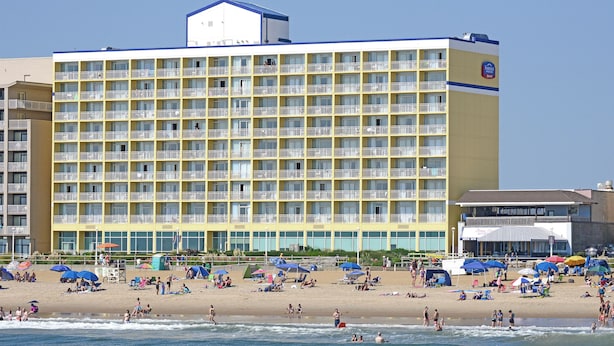 A large hotel with multiple balconies and a beach in front. - Fairfield Inn & Suites by Marriott Virginia Beach Oceanfront (Virginia Beach)