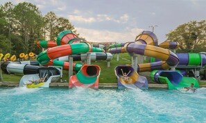 A water park with multiple water slides in various colors. - Fairfield Inn & Suites by Marriott Virginia Beach Oceanfront (Virginia Beach)