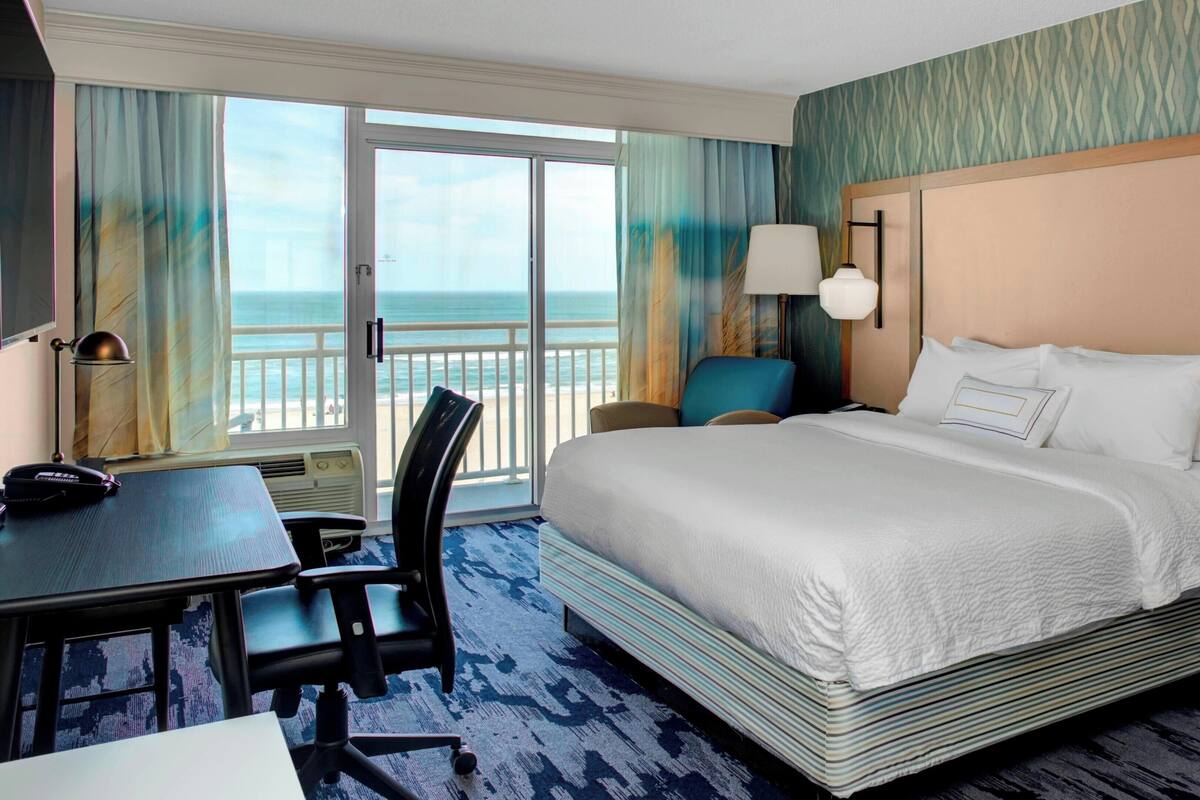 Premium bedding, down comforters, desk, laptop workspace