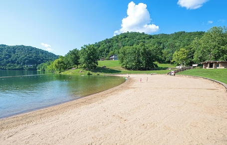 On the beach, beach volleyball, kayaking, motor boating. Buckhorn Lake State Resort Park