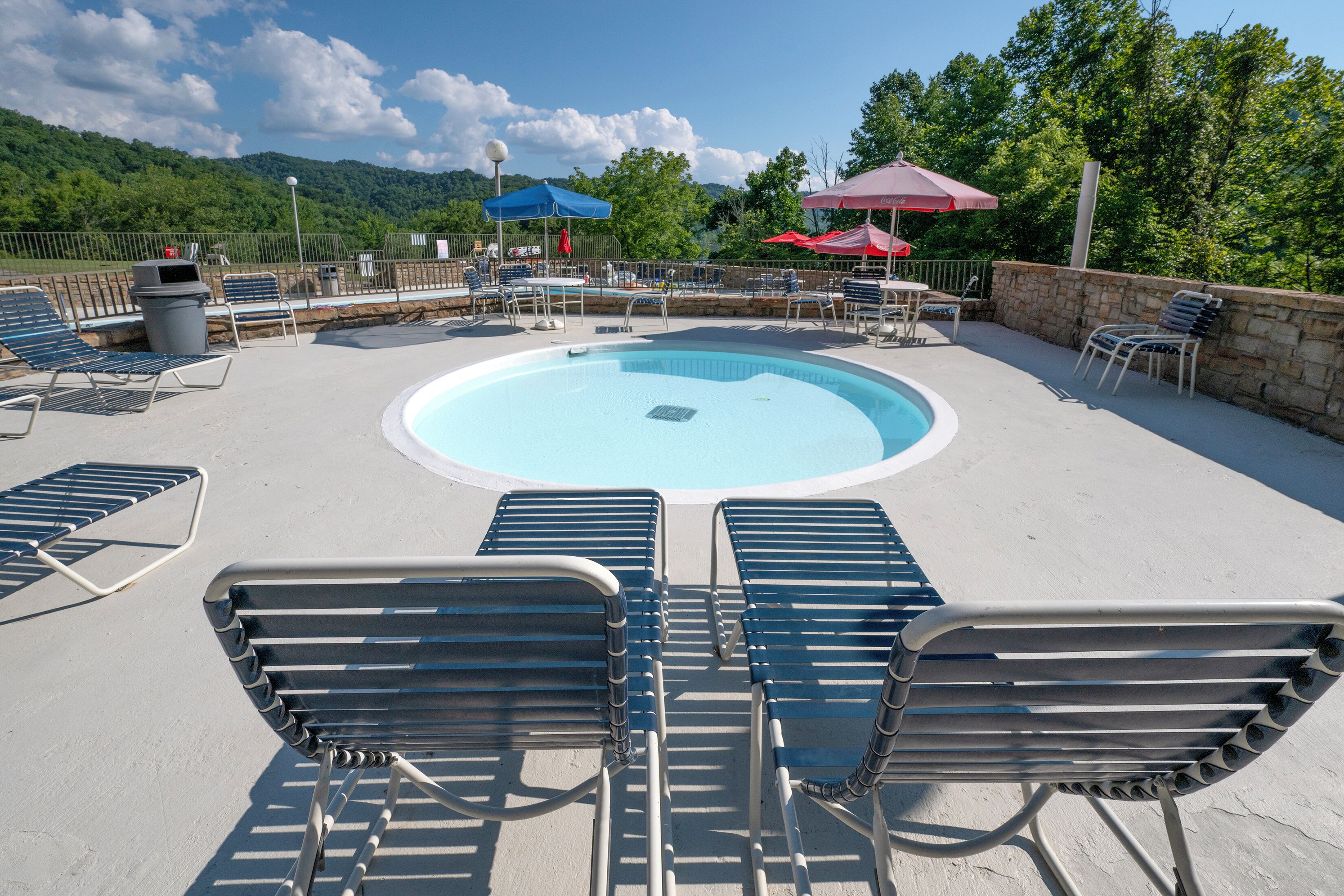 outdoor pool, pool umbrellas, pool loungers