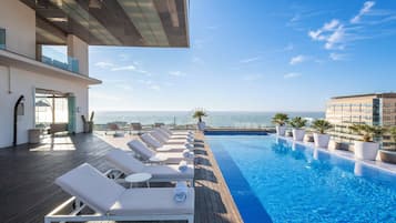 Outdoor pool, sun loungers