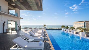 Outdoor pool, sun loungers