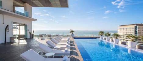 Outdoor pool, sun loungers