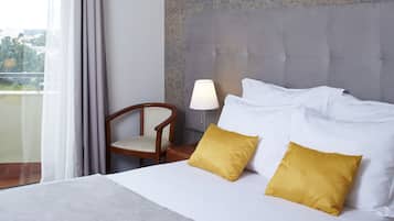 Habitación individual | 1 habitación, minibar, caja de seguridad en la habitación y escritorio