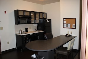 Full-sized fridge, microwave, stovetop, dishwasher