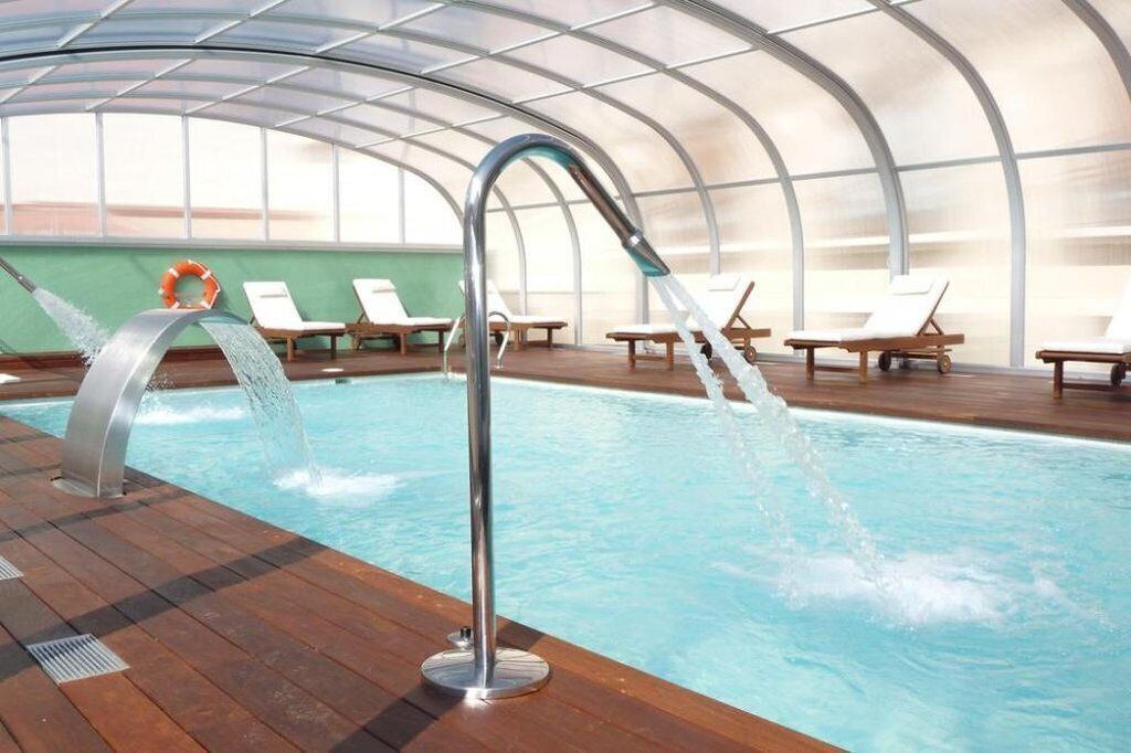 indoor pool, seasonal outdoor pool, pool loungers