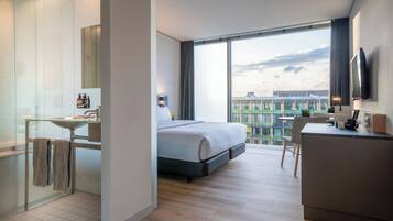 Innside Premium Room | Frigobar, cortinas blackout, ferros/tábuas de passar roupa