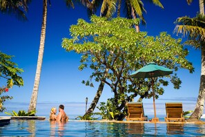 Outdoor pool, pool umbrellas, sun loungers