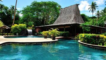 Outdoor pool, pool umbrellas, sun loungers