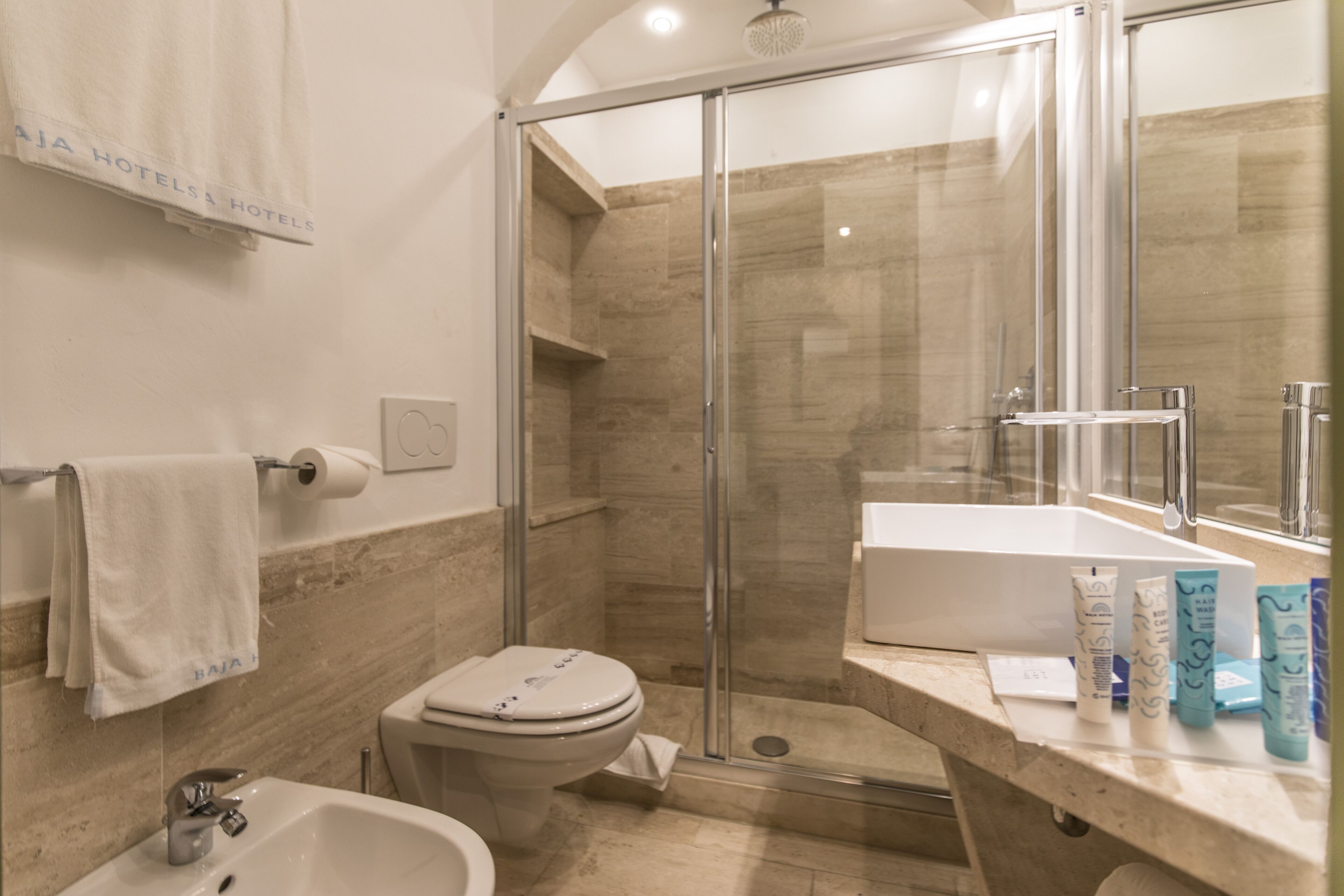 free toiletries, hair dryer, bidet, towels