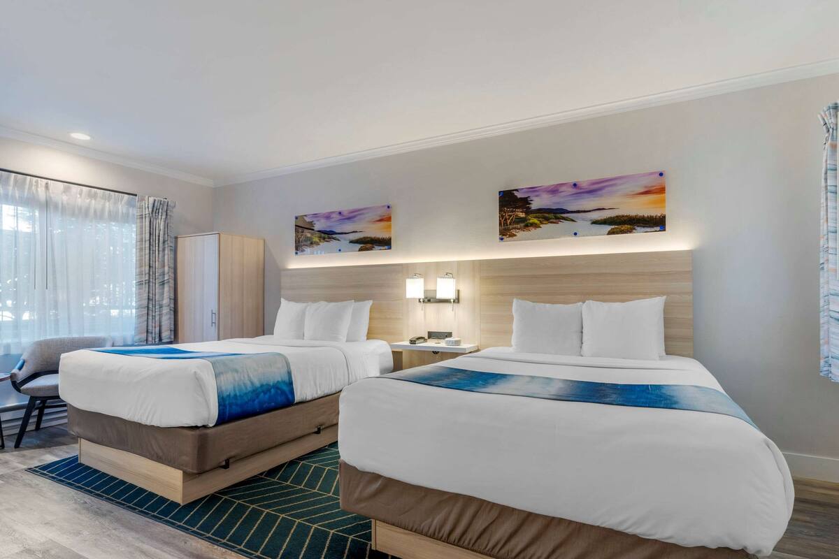 room, 2 queen beds, non smoking | in-room safe, desk, laptop workspace, blackout curtains