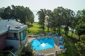 Seasonal outdoor pool, open 10:00 AM to 7:00 PM, sun loungers
