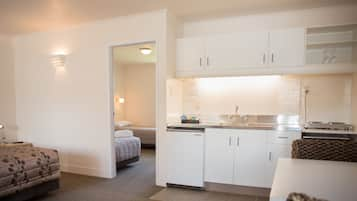 Standard Suite, 1 Bedroom, Non Smoking, Kitchenette | Iron/ironing board, rollaway beds, free WiFi, bed sheets