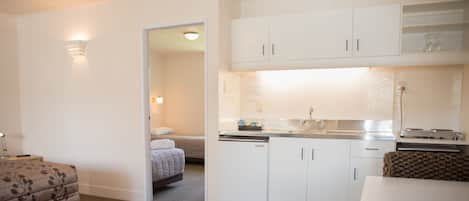 Standard Suite, 1 Bedroom, Non Smoking, Kitchenette | Iron/ironing board, rollaway beds, free WiFi, bed sheets