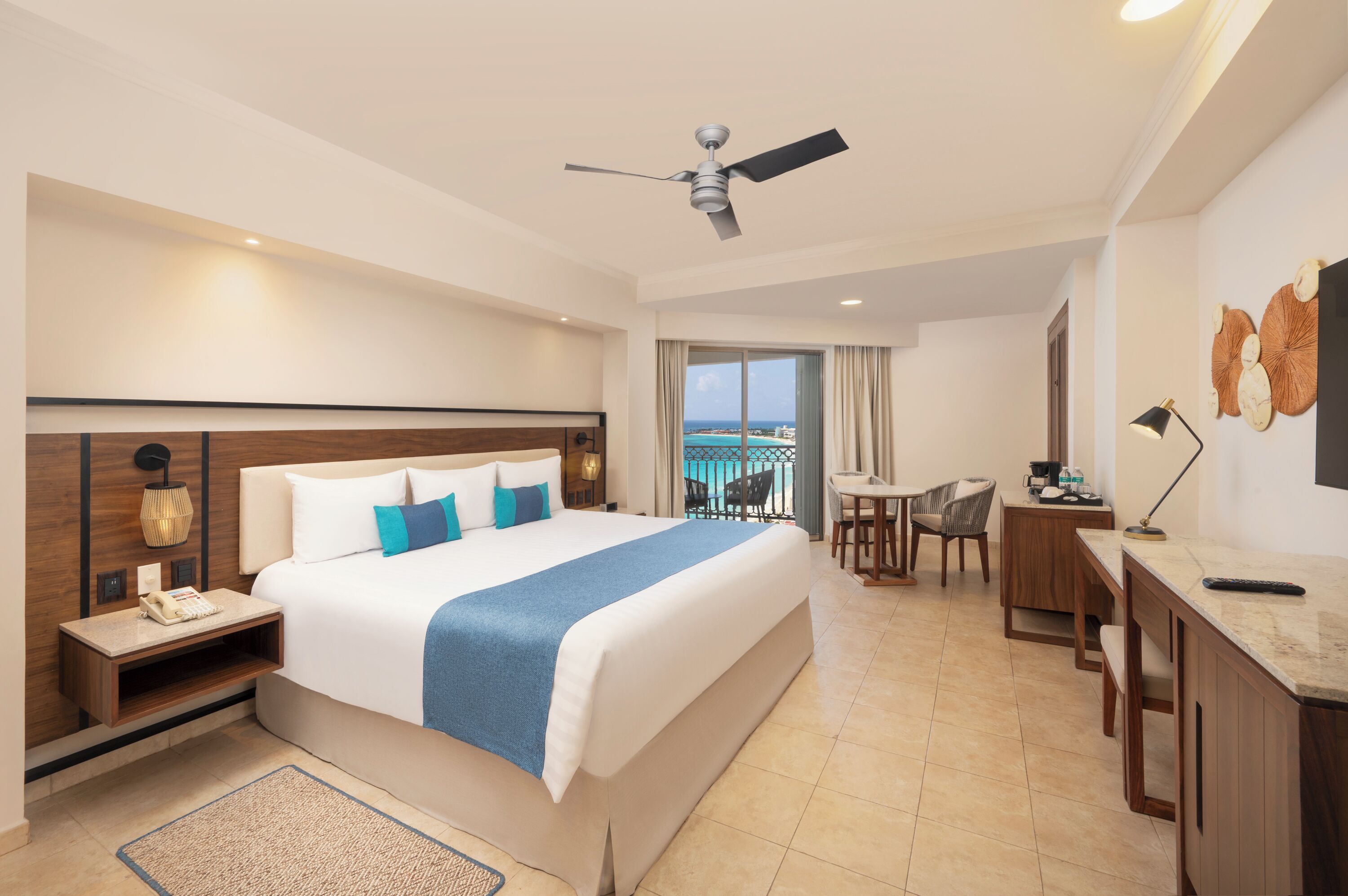 Deluxe Room, Balcony Partial Ocean View | Free minibar items, in-room safe, desk, blackout drapes