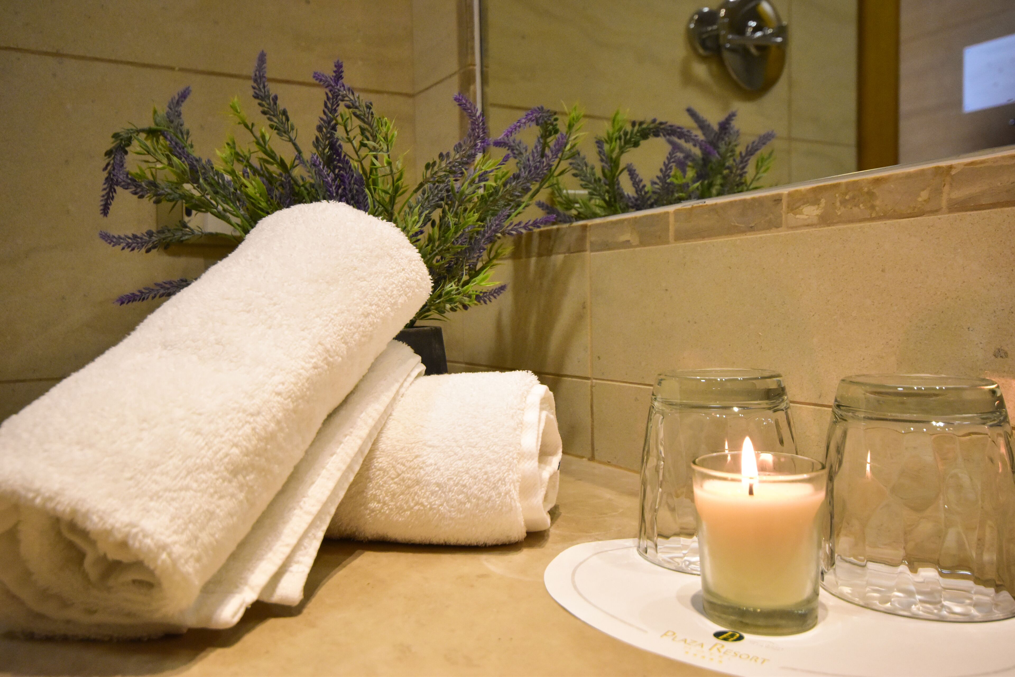 bathtub, bathrobes, slippers, towels