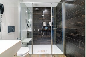 Eco-friendly toiletries, hair dryer, bathrobes, slippers