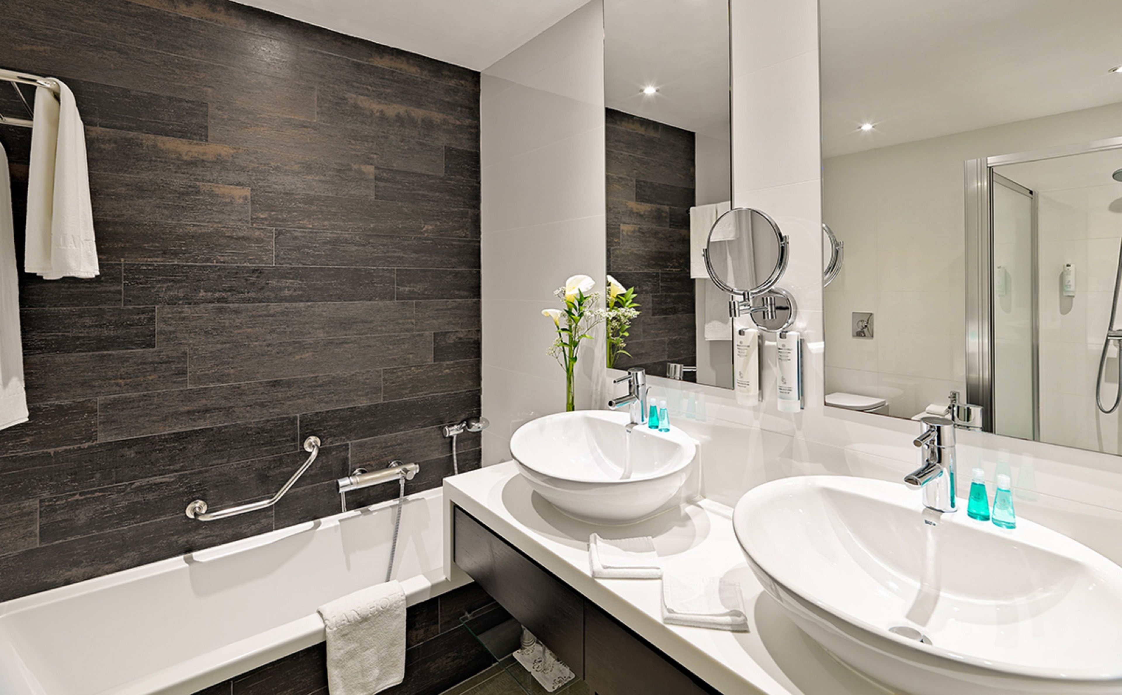 combined shower/bathtub, eco-friendly toiletries, hair dryer, bathrobes