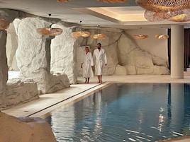 Indoor pool, outdoor pool, pool umbrellas, sun loungers