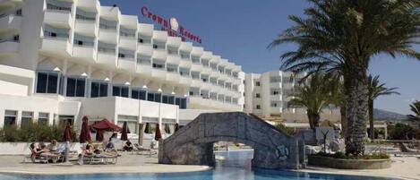 Indoor pool, outdoor pool, pool umbrellas, pool loungers