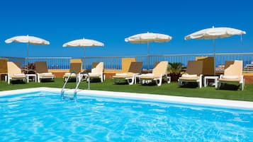 Outdoor pool, pool umbrellas, pool loungers