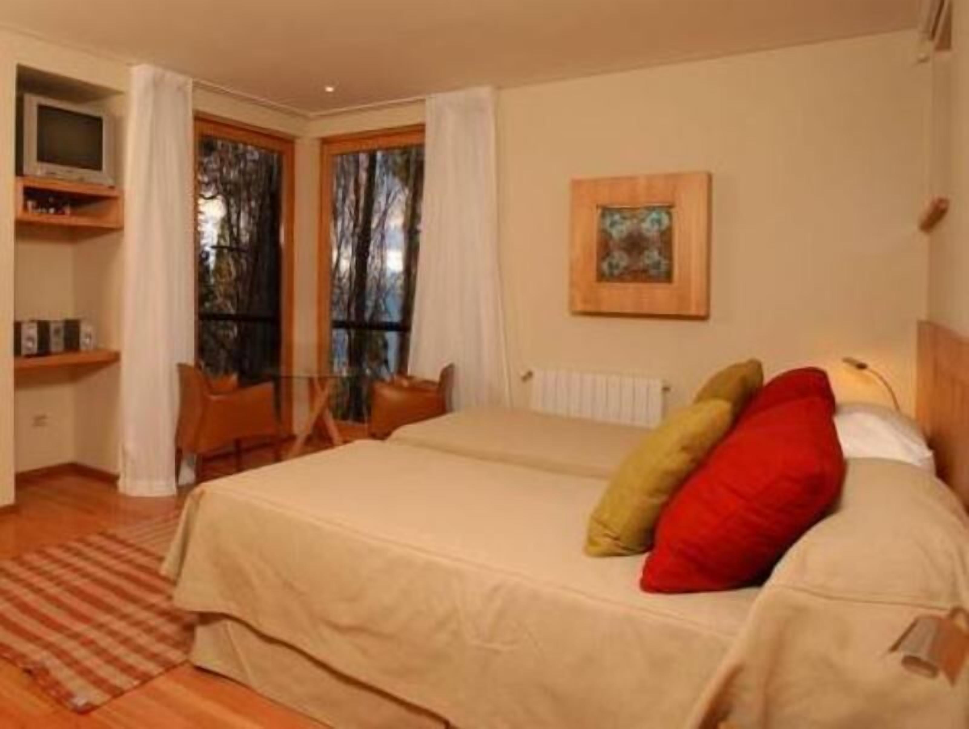 Premium bedding, down comforters, pillowtop beds, minibar