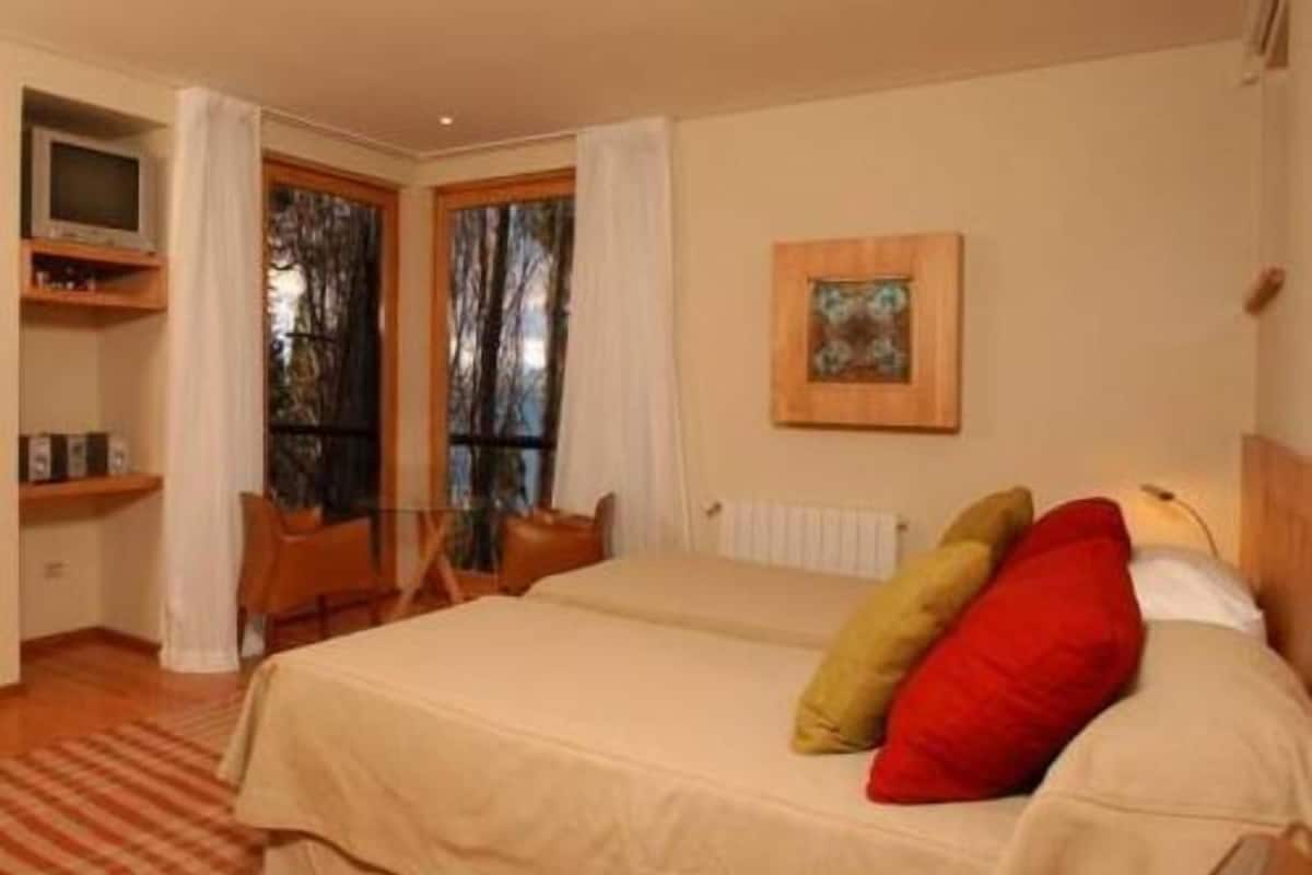 Premium bedding, down comforters, pillowtop beds, minibar