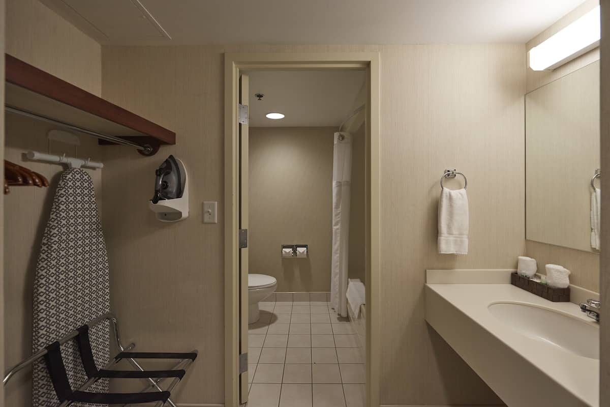 suite, 1 queen bed | bathroom | free toiletries, hair dryer, towels