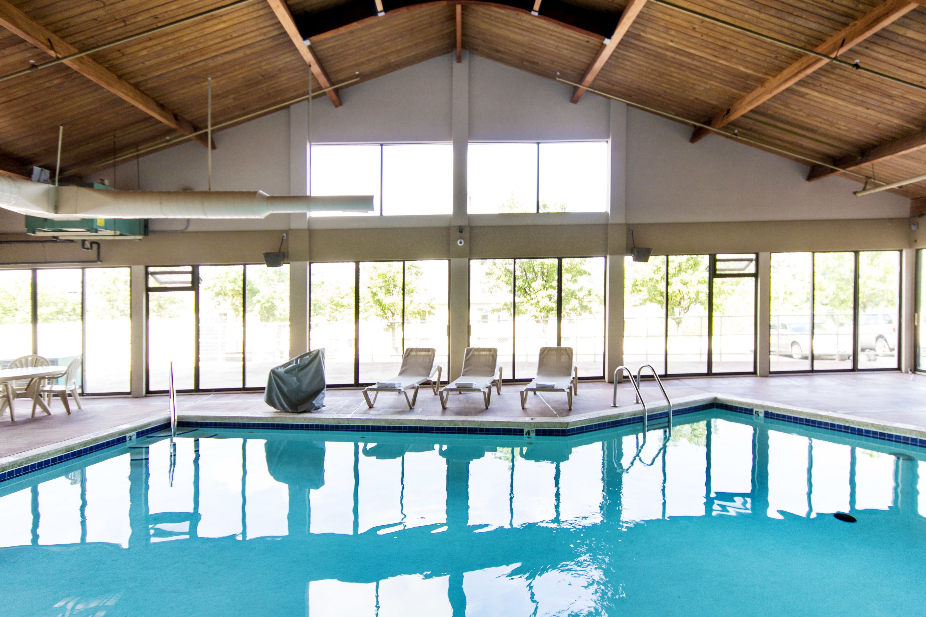 indoor pool, outdoor pool, pool loungers