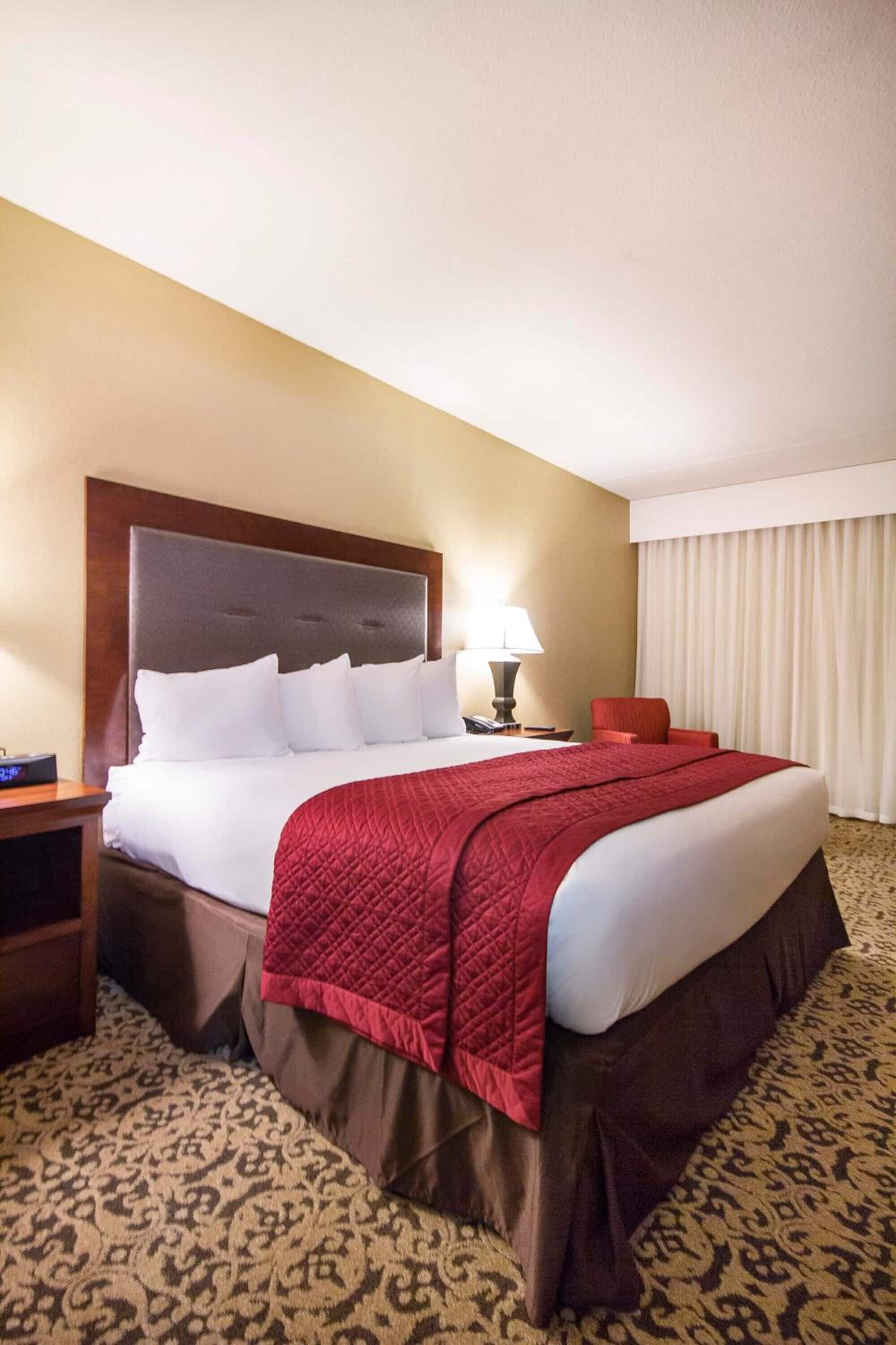 premium bedding, desk, blackout curtains, iron/ironing board