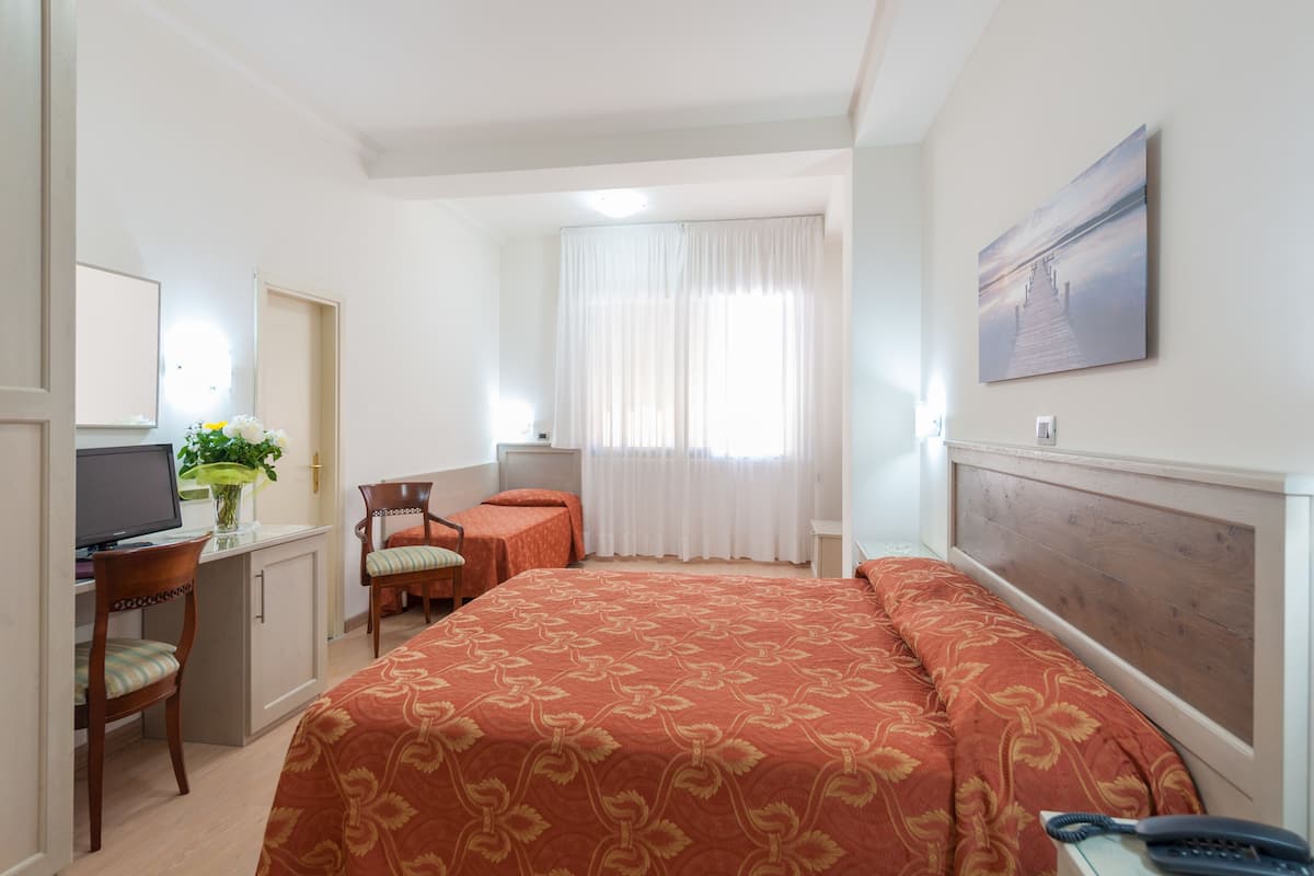 superior triple room | down duvets, minibar, in-room safe, desk