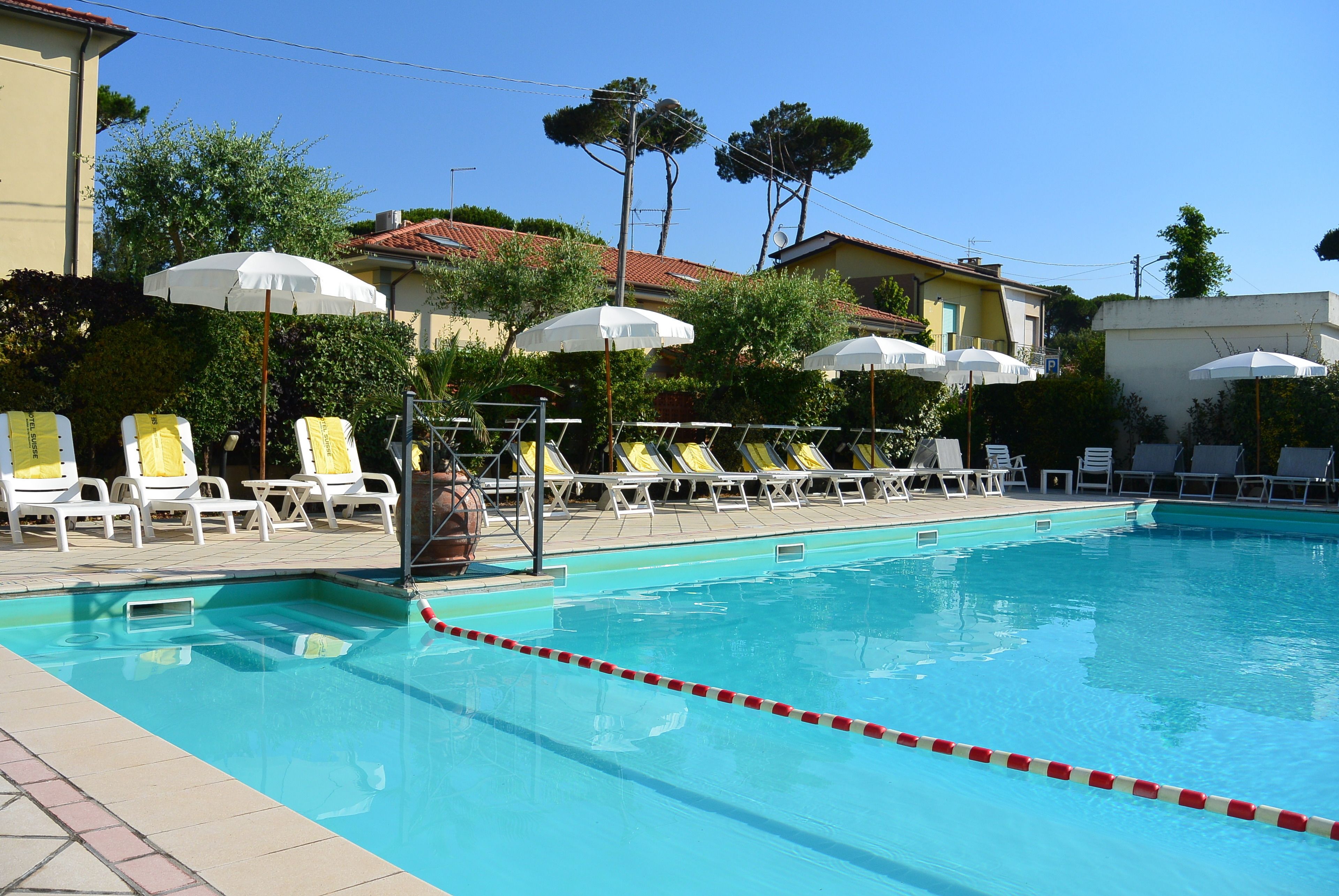 seasonal outdoor pool, open 9:00 am to 7:00 pm, pool umbrellas