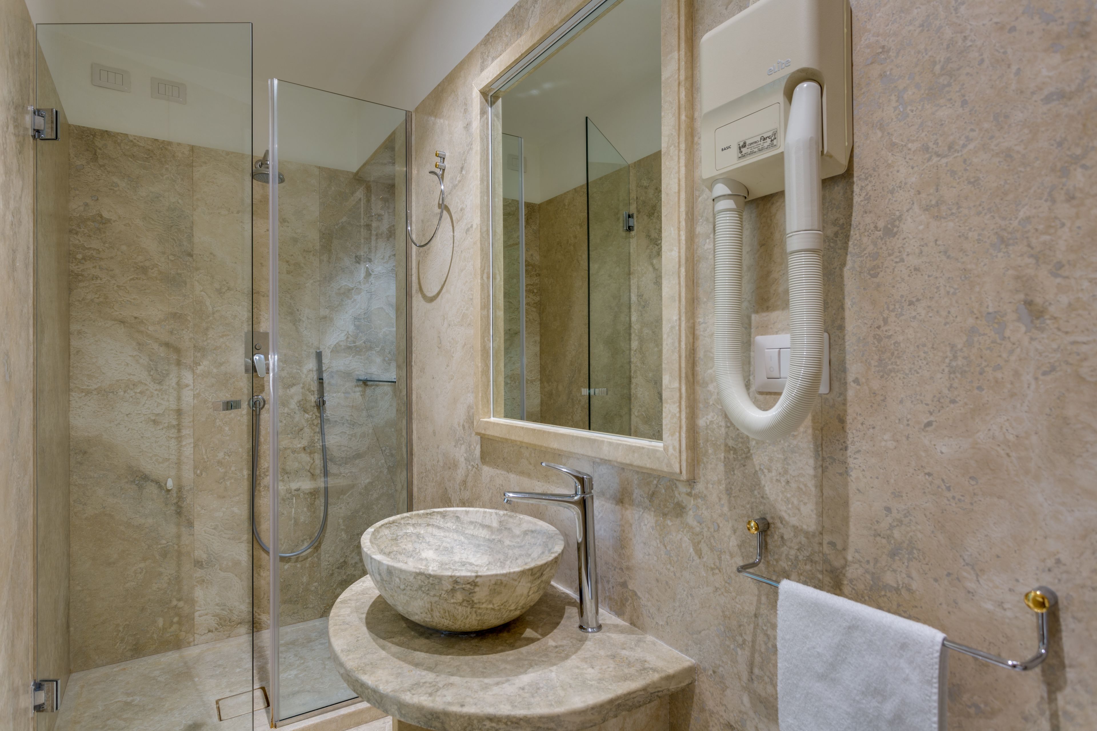 free toiletries, hair dryer, bidet, towels