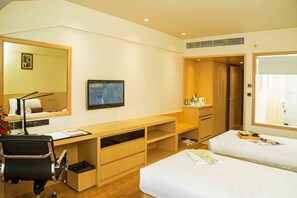 Ropa de cama de alta calidad y minibar 