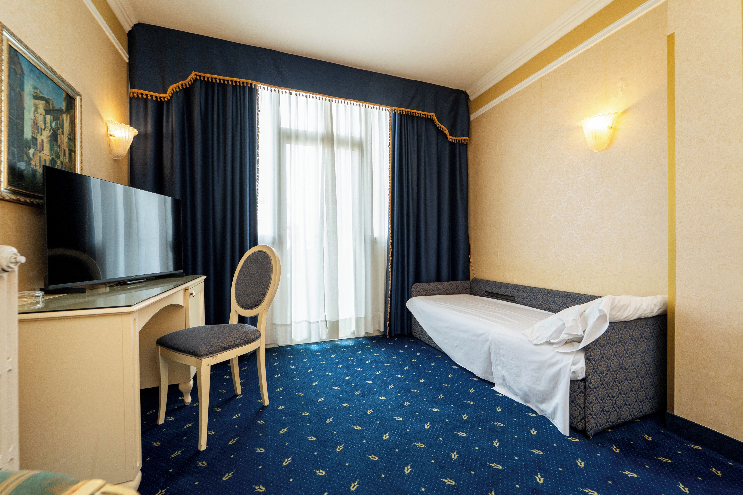 Camera tripla | Biancheria da letto ipoallergenica, minibar, una cassaforte in camera