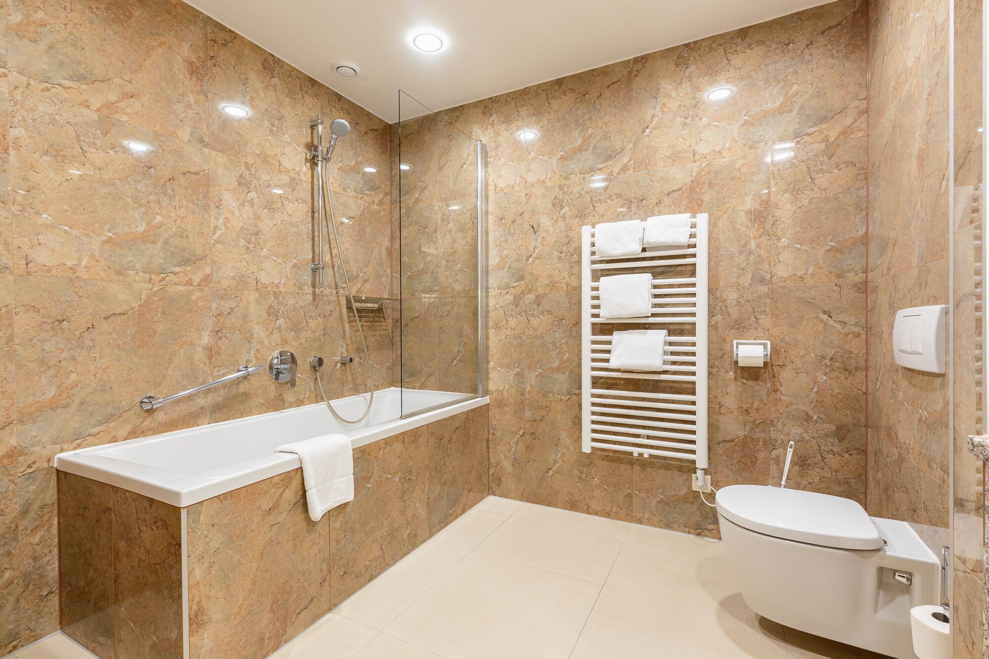 junior studio suite | bathroom | free toiletries, hair dryer, bathrobes, towels