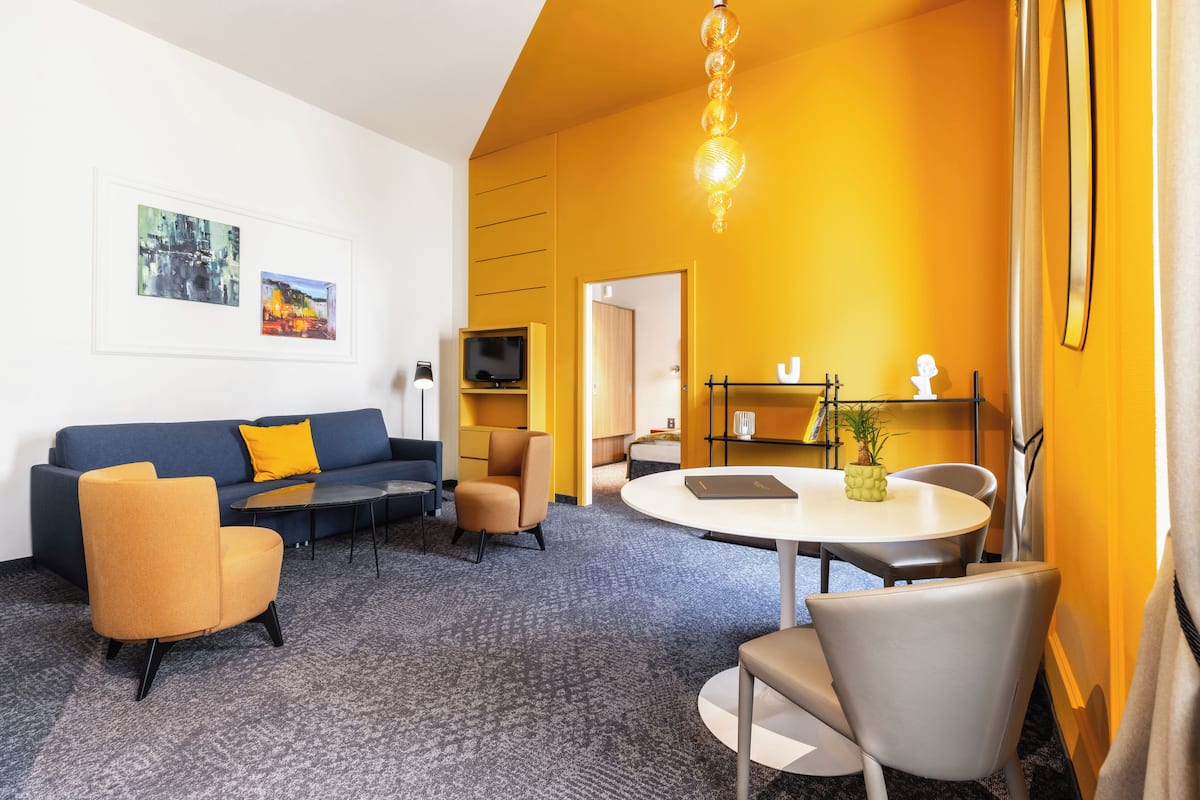 Family Suite | Living area | Flat-screen TV
