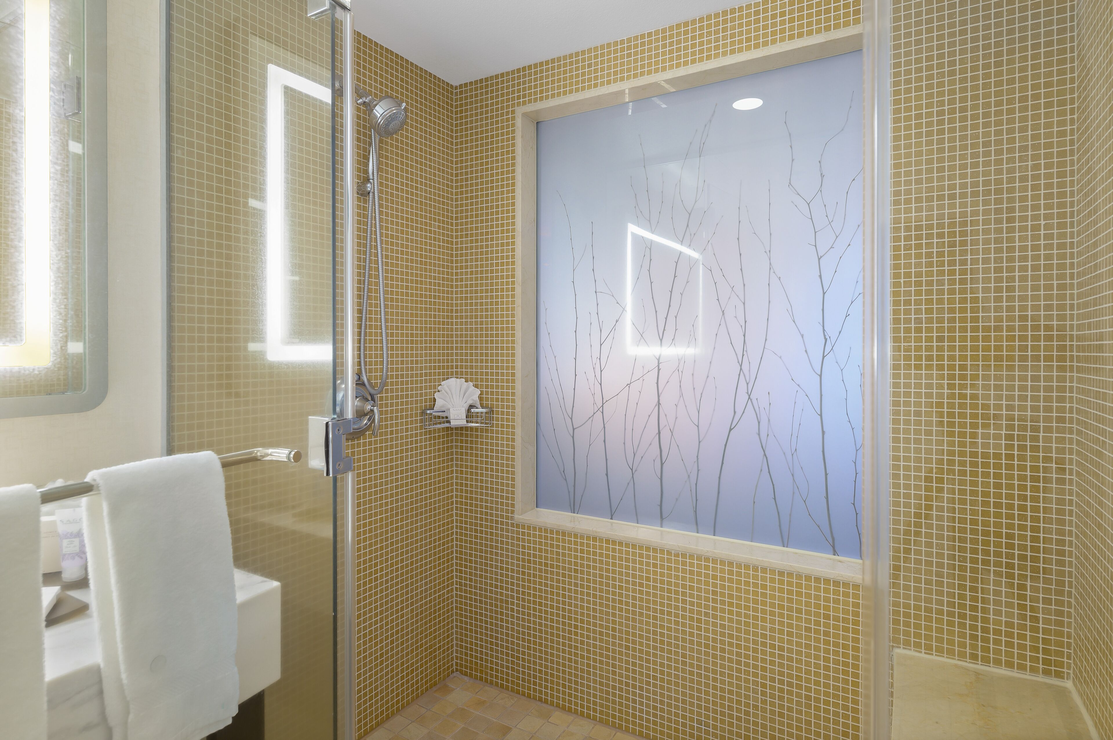 designer toiletries, hair dryer, bathrobes, towels