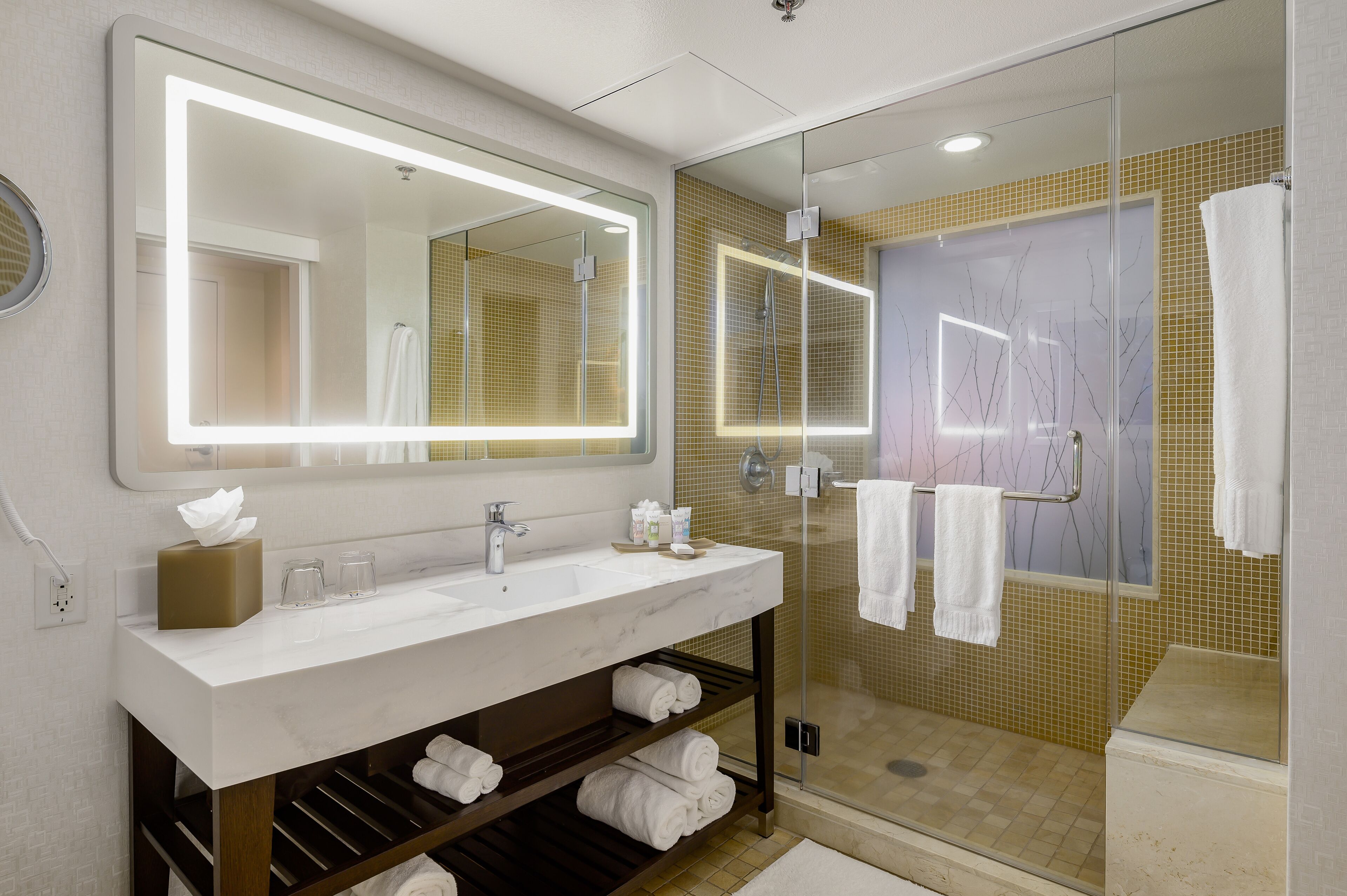 designer toiletries, hair dryer, bathrobes, towels