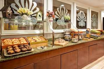 Daily buffet breakfast (USD 14.95 per person)