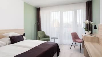 Habitación superior | Minibar, caja fuerte, wifi gratis y ropa de cama