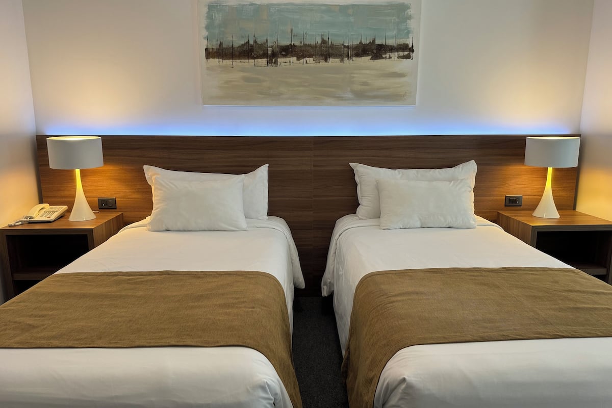 luxury room | down duvets, minibar, in-room safe, blackout curtains