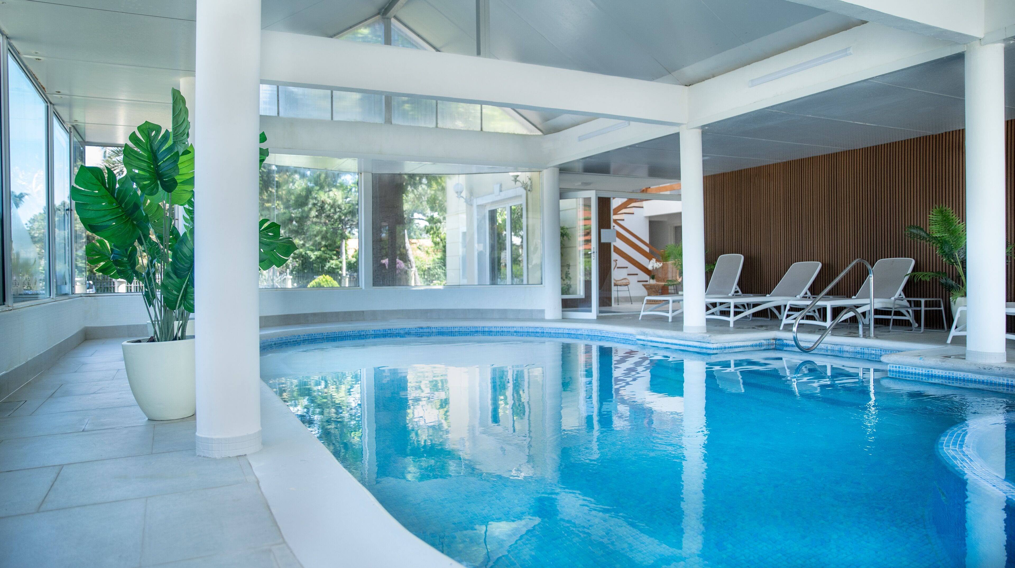 Outdoor pool, open 9:00 AM to 8:00 PM, pool loungers