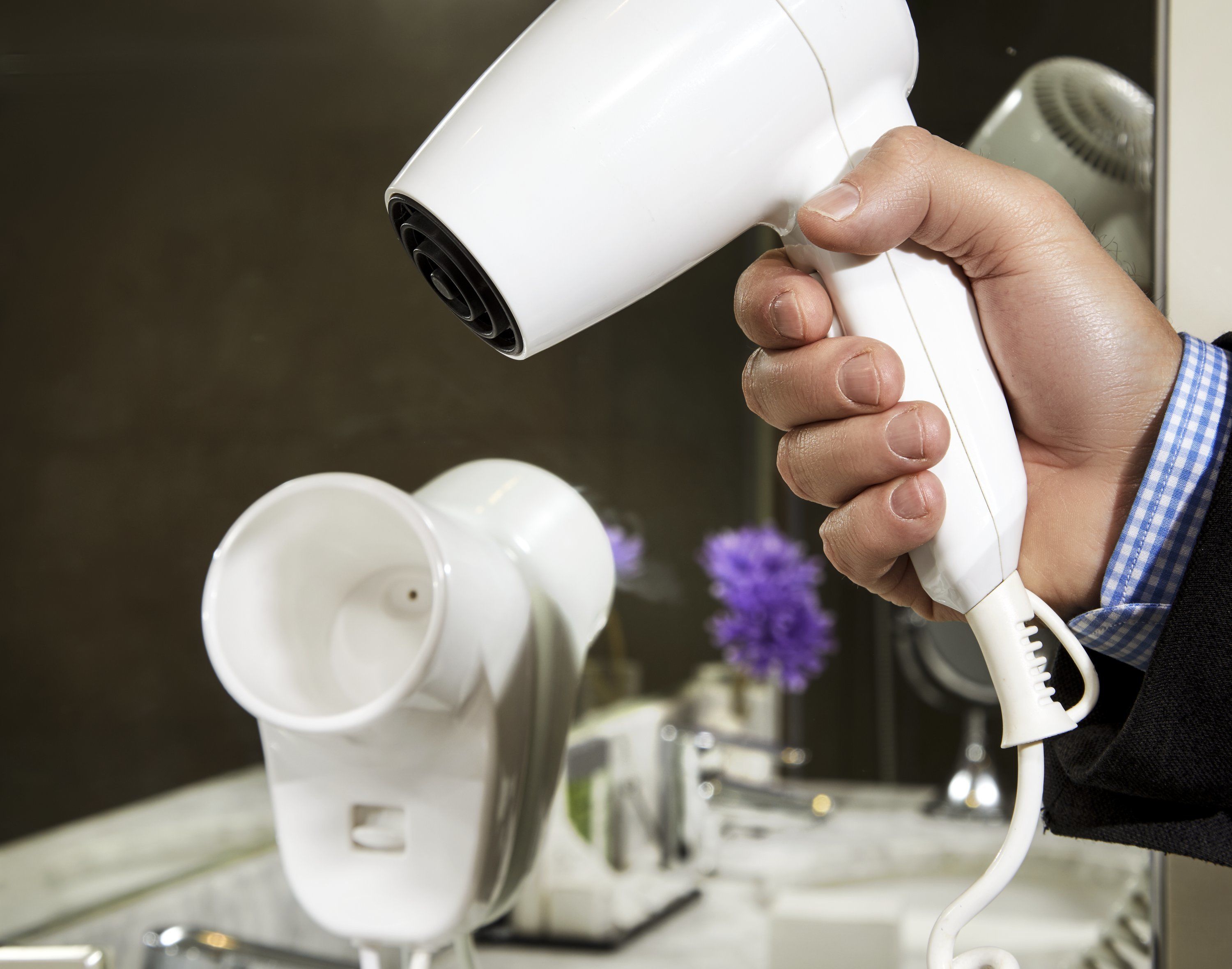 designer toiletries, hair dryer, bidet, towels